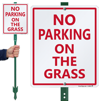 NO PARKING ON THE GRASS Sign
