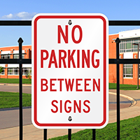 NO PARKING BETWEEN Sign