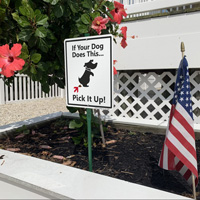 Dog poop pick-up policy sign